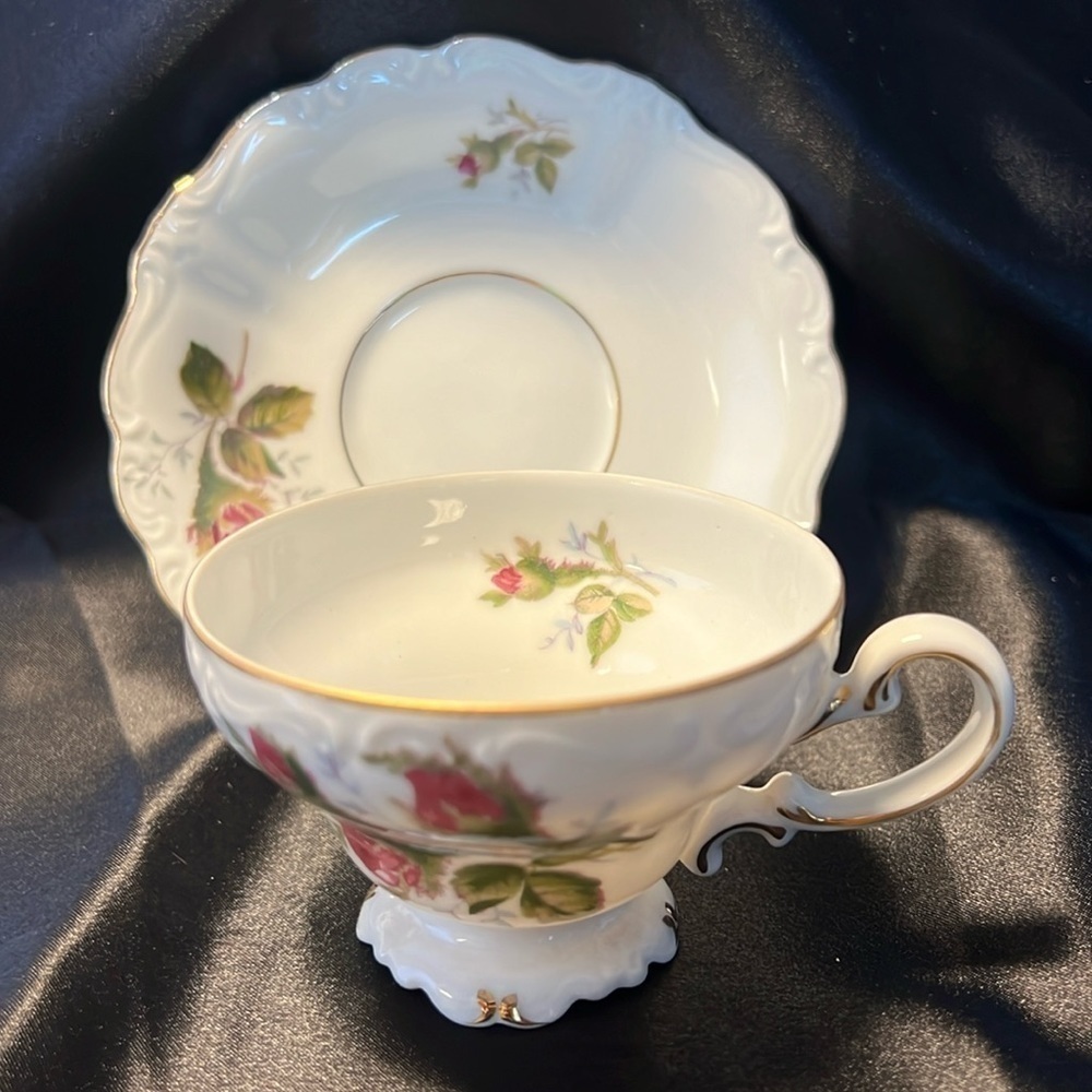 Hand painted porcelain,footed demitasse cup & saucer. Occupied Japan.